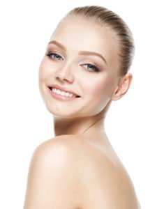 Tampa Facial Rejuvenation model smiling in front of a white background