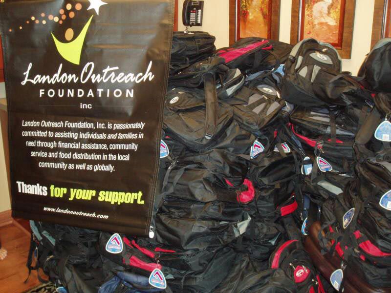 landon outreach foundation large pile of backpacks