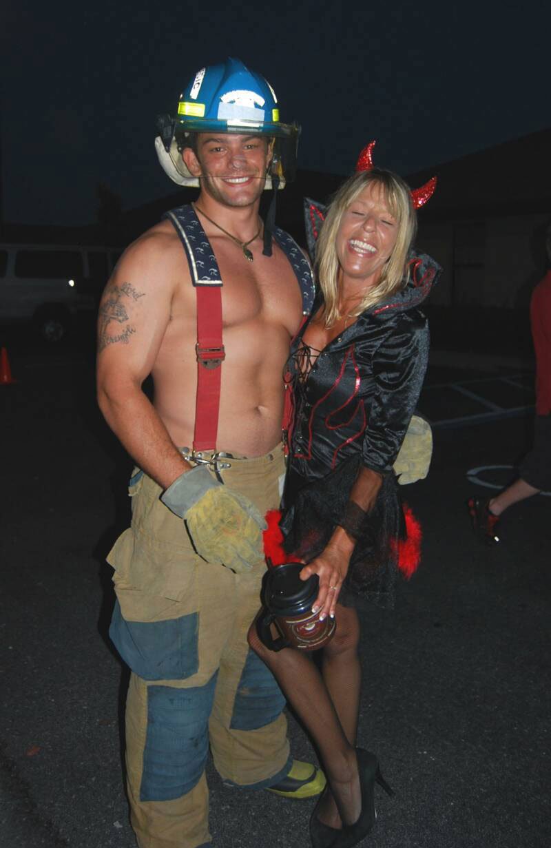 chill under the stars couple in halloween costumes