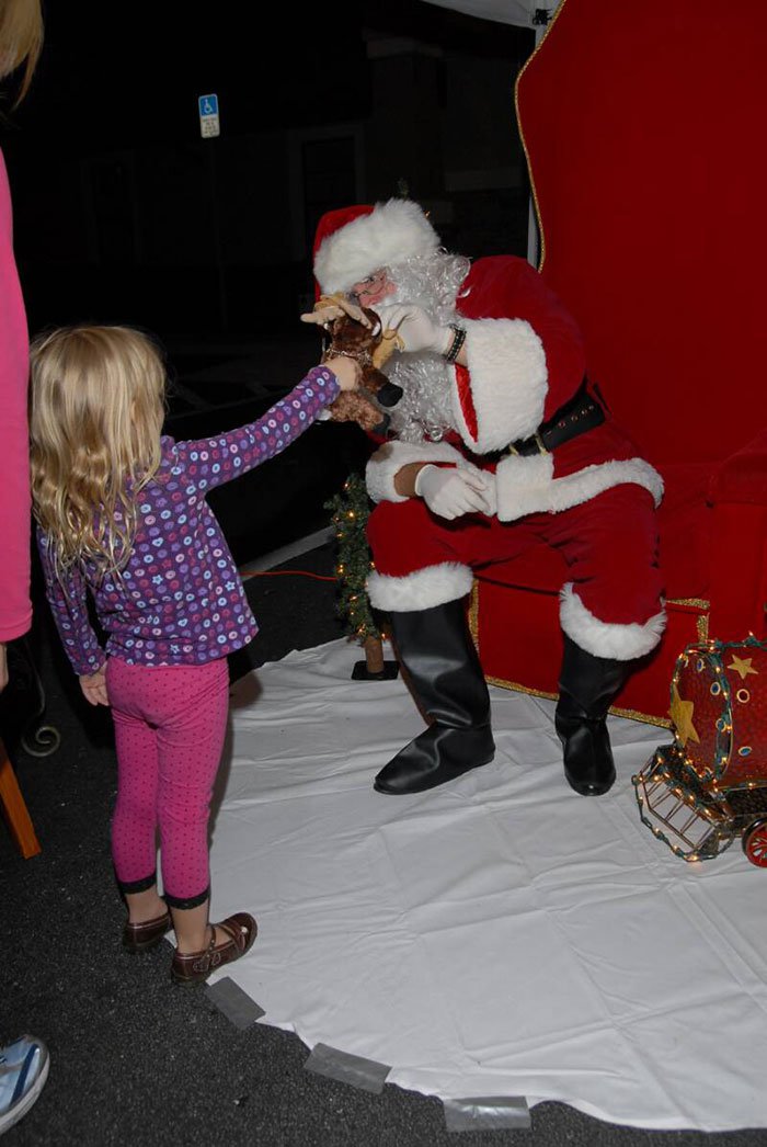 red carpet event child with santa